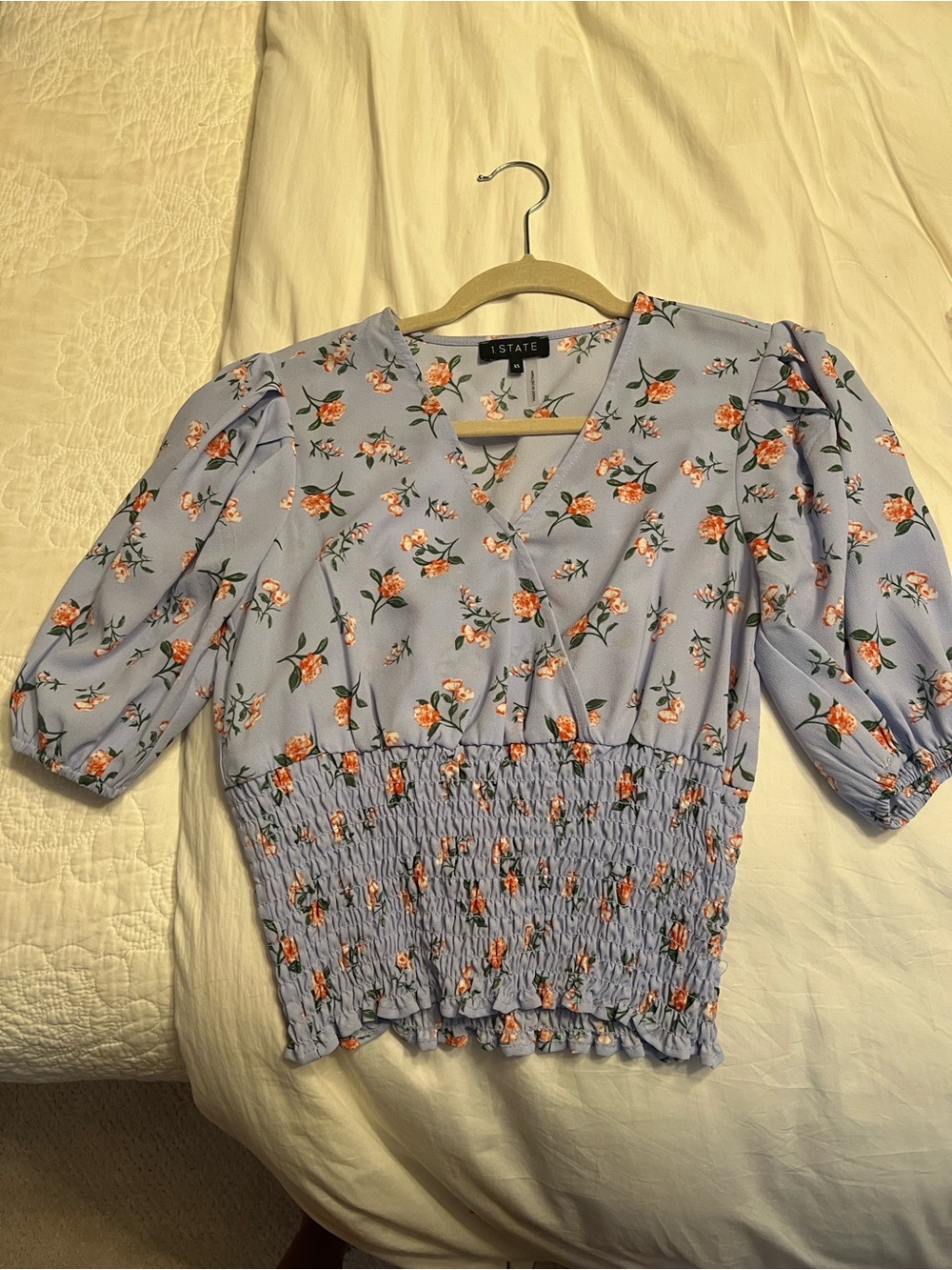 1 .STATE Smocked Puff-Sleeve Surplice Top in  blue floral print